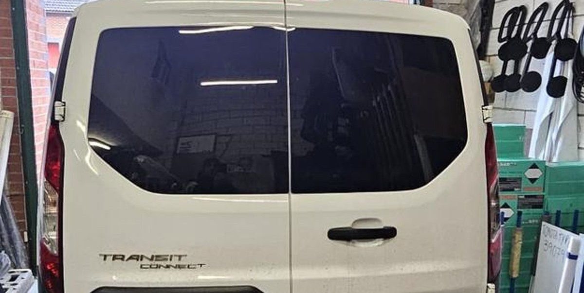 Completed Ford Transit Connect conversion with both privacy windows fitted by AWG Windscreens